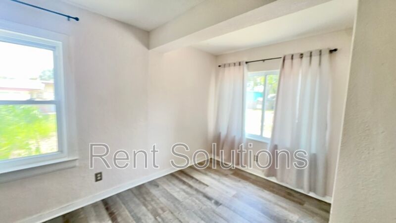 Charming Dunedin Retreat: 2BR Home with Sunroom & Garage! property image