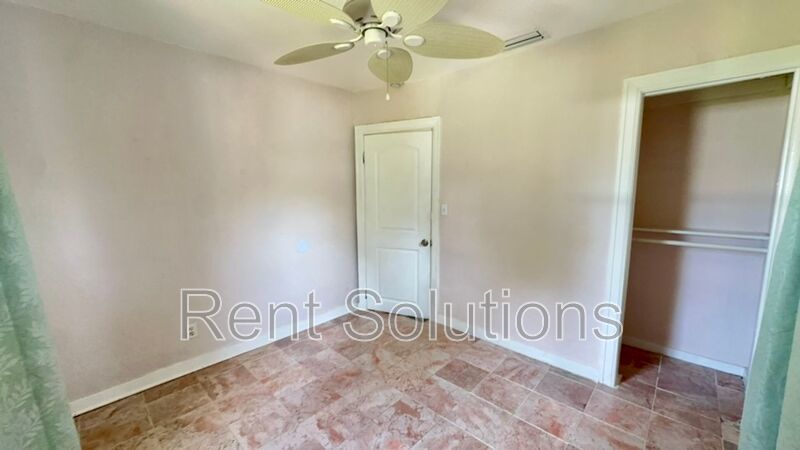 Charming Dunedin Retreat: 2BR Home with Sunroom & Garage! property image