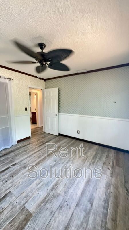 Charming Dunedin Retreat: 2BR Home with Sunroom & Garage! property image