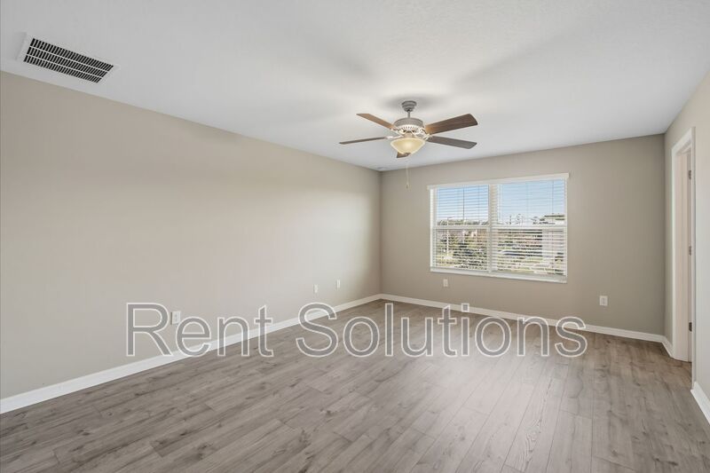 Modern 3-Bedroom Home with Garage in Gated Belmont II – Resort-Style Amenities & Prime Location property image