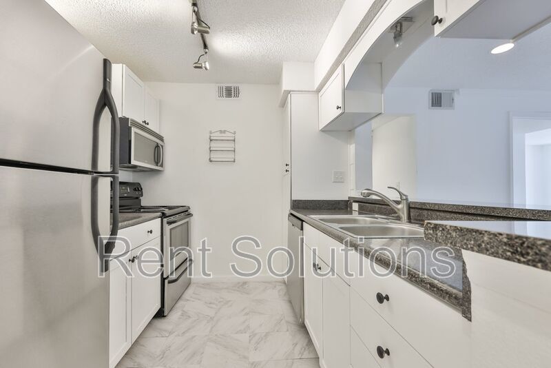 Spacious 2-bedroom, 2-bath condo in the Fountains at Countryside, Gated Community! property image