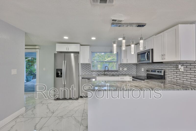 MOVE IN READY! EVERYTHING Updated! 3 bedroom 2 bathroom Pool Home in Largo property image