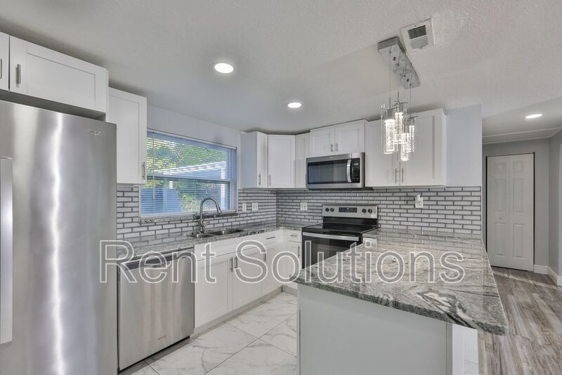 MOVE IN READY! EVERYTHING Updated! 3 bedroom 2 bathroom Pool Home in Largo property image