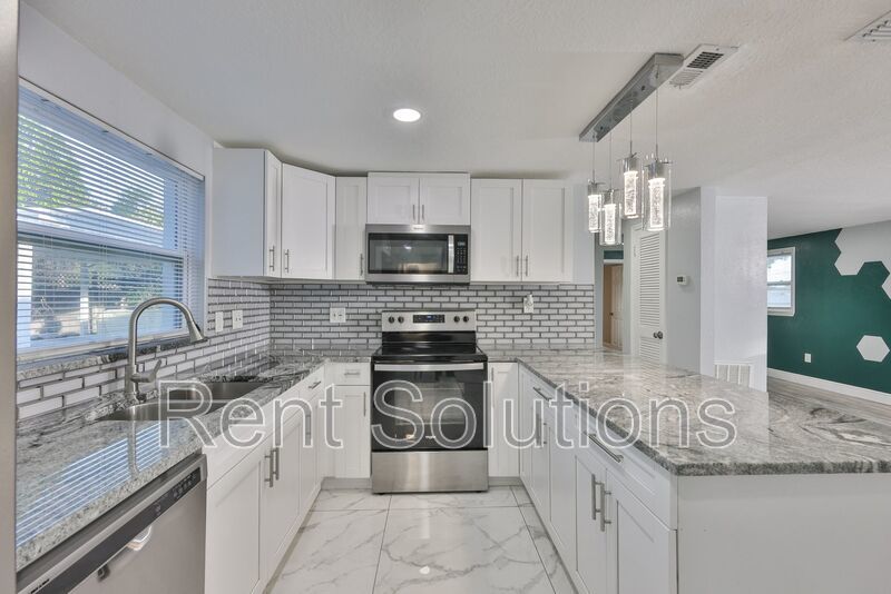 MOVE IN READY! EVERYTHING Updated! 3 bedroom 2 bathroom Pool Home in Largo property image