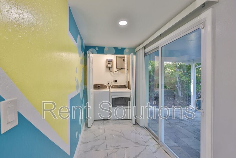 MOVE IN READY! EVERYTHING Updated! 3 bedroom 2 bathroom Pool Home in Largo property image