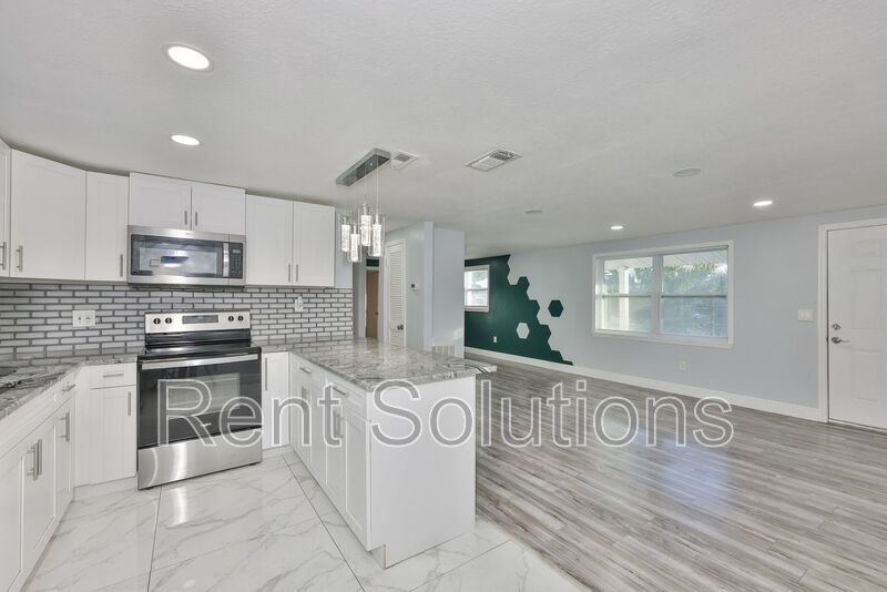 MOVE IN READY! EVERYTHING Updated! 3 bedroom 2 bathroom Pool Home in Largo property image